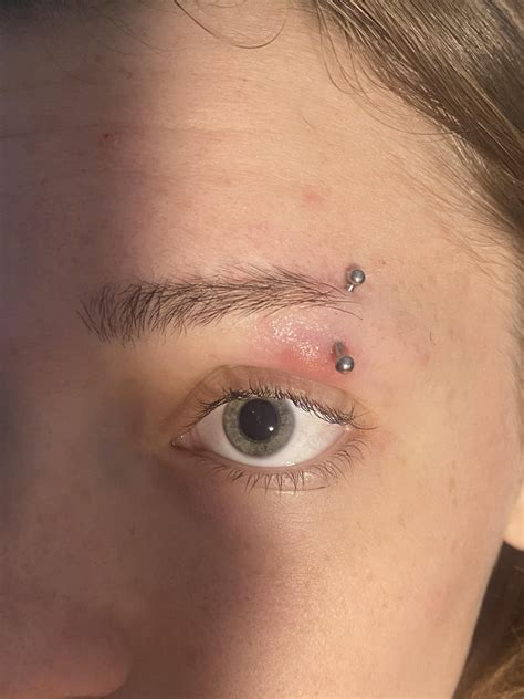 is my eyebrow piercing infected or just angry? : r/Legitpiercing