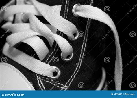Black Shoe with White Shoelaces Stock Photo - Image of shoestring, shoe ...