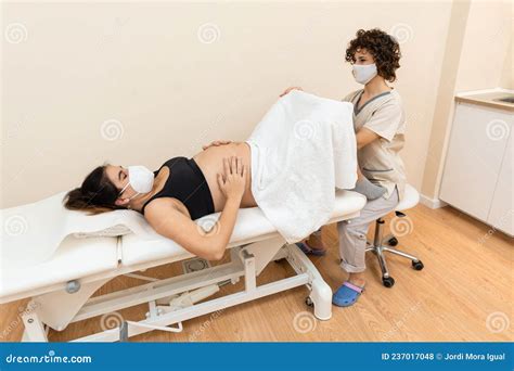 Gynecologist Examining and Performing Pelvic Floor Treatment on ...
