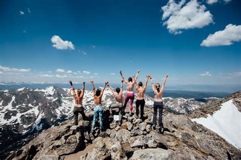 Women are posing topless on mountaintops for 'empowerment'