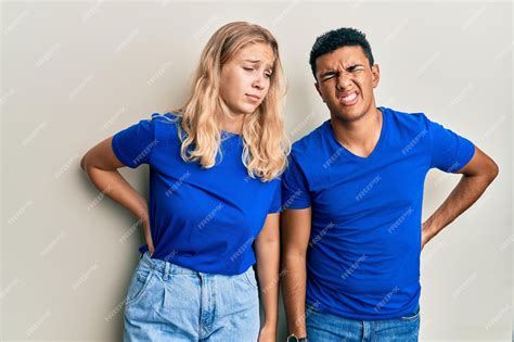 Premium Photo | Young interracial couple wearing casual clothes ...