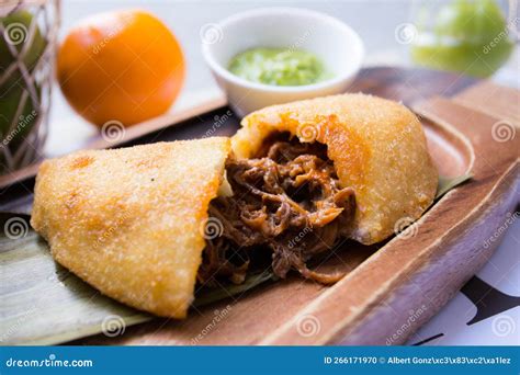 Venezuelan Venezuelan Empanadas are Made from Precooked White or Yellow ...