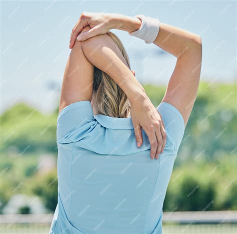 Premium Photo | Tennis woman stretching arms and fitness warm up at ...