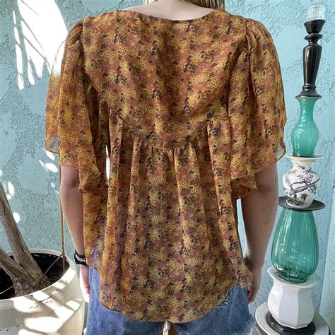 Super flattering autumn colored blouse! Could be... - Depop