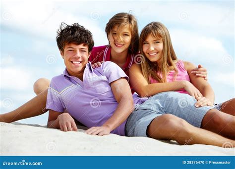 Teens on the beach stock photo. Image of group, outdoor - 28376470