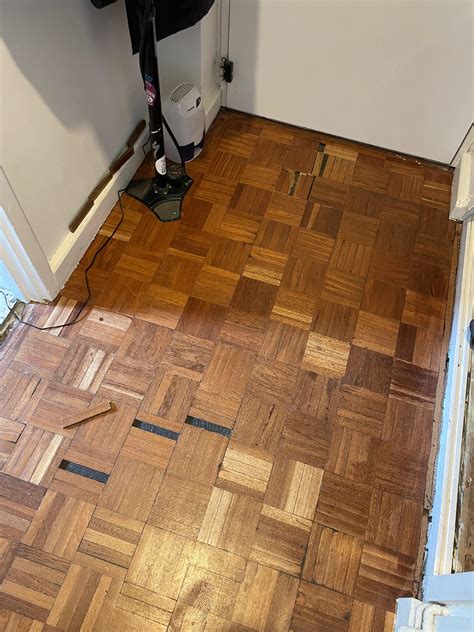 Fix hardwood floor after damp issue causing it to bulge : r/DIYUK
