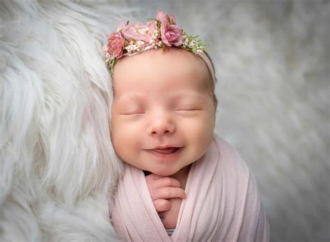Smiling Newborn Baby