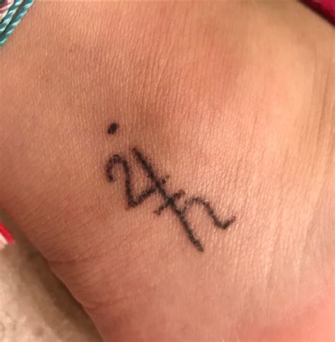 Saturn Symbol Tattoo