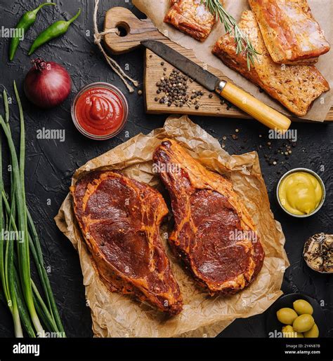 Marinated t bone beef steak top view Stock Photo - Alamy