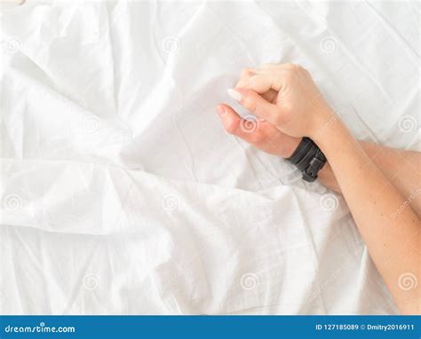 Close Up Hands of a Couple Make Love Hot Sex on a Bed Stock Image ...
