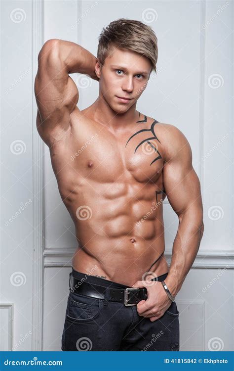 Muscular Young Naked Man Posing in Jeans Stock Photo - Image of ...