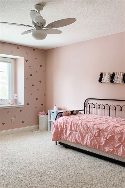 Pretty pink girls bedroom with cute accent wall | Girls room paint ...