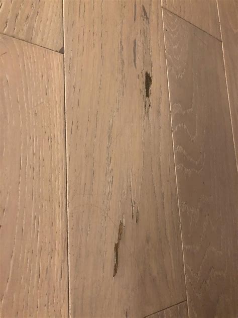 Moved in recently. Love the floor but there are loads of scratches ...