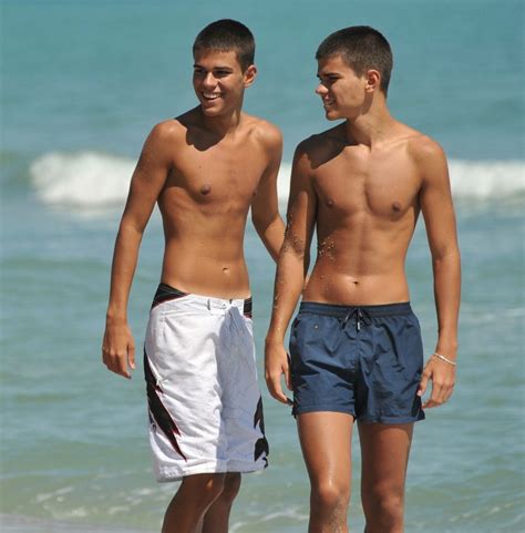 Boys in short shorts: Cute beach boys