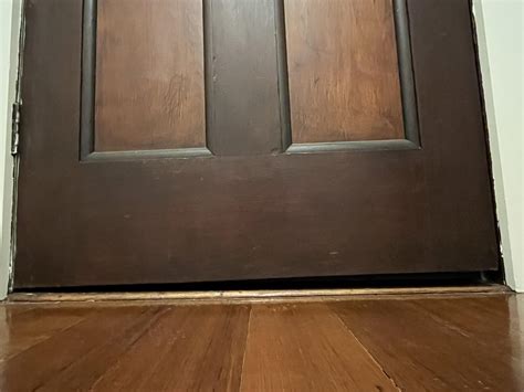 Gap seal front door - as you’ll see from photo, our floor is slopping ...