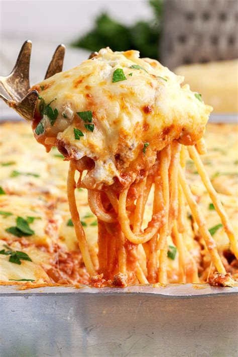 Layers of savory meat sauce, spaghetti, ricotta, and both mozzarella ...