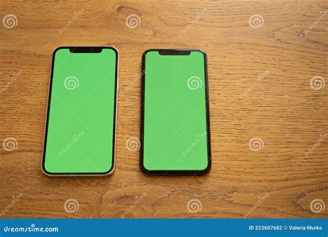 Two Phones with Green Screens. Green Screen. Mockup Phone Stock Photo ...