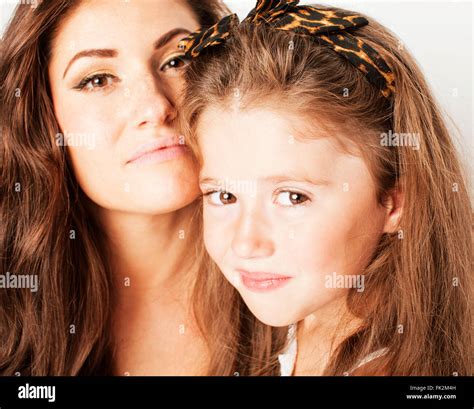 bright picture of hugging mother and daughter happy together, smiling ...