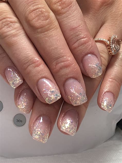 9 Ombre Nails With Glitter: A Trendy And Sparkly Manicure