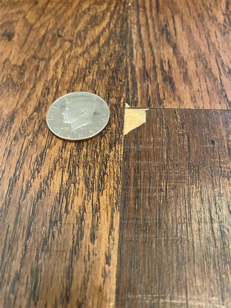 How to fix chip in top layer of vinyl wood flooring? : r/HomeMaintenance