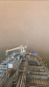 CARGO SHIP ENTERS MASSIVE DUST STORM Dramatic footage shows a large container ship navigating through a towering dust storm reportedly off the coast of Egypt, as the vessel's bridge and deck are engulfed in a vast cloud of sand. Source: freudian_nipps on IG | ROYAL FM 94.3 | Facebook