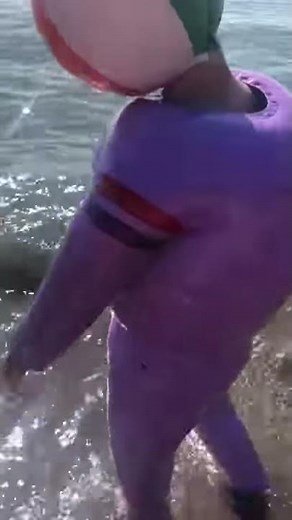 At Wreck Beach in Vancouver wearing an inflatable plastic suit