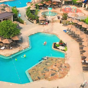 Endless Summer! Our heated outdoor pools and kids splash zone will remain open through Monday, October 9 (weather permitting). Starting on Tuesday, September 5, the Oasis Pool will be an adults-only pool for those 18 & older. | Eden Resort & Suites
