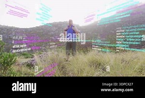 Mature hiker climbing ridge and pausing for scanning slope with floating cyan tech code panels. Adventure, exploration, technology, outdoors, innovative, rugged, determination Stock Video Footage - Alamy