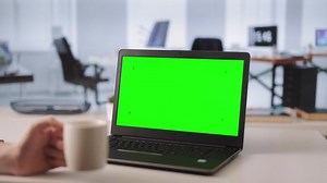 clip-1091011521-close-office-worker-working-on-modern-laptop