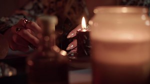 dark magic ritual with crystals and black candles