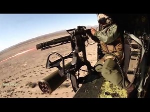 M134 Minigun and heavy machine gun on USMC UH-1Y Venom helicopter.