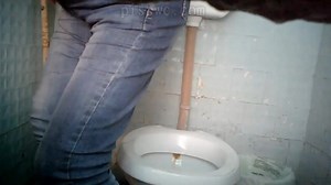 Girl In Jeans Urgently Needs The Toilet