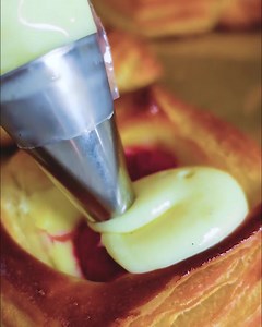 Raspberry & cream cheese-filled danish with fresh vanilla bean custard! That might seem like a mouthful, but these danish are worth every word. Laminating dough can be tricky, and the right tool makes all the difference. Our dough sheeter made the process easier, more precise, ad more fun! Head here to learn more https://brodandtaylor.com/products/dough-sheeter | Brod & Taylor