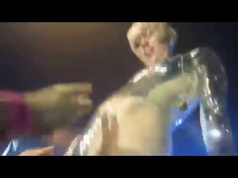 MILEY CYRUS lets fans touch her