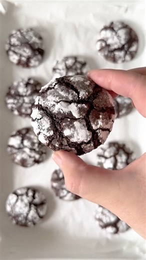 Cup of tea weather means cookie weather for us, and these chocolate crackle cookies are our dipping medium of choice 🍪 🍫 Get the full recipe from SBS Food here: https://bit.ly/3xLwk3g | SBS Australia