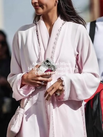 Alexandra Saint Mleux with Charles Leclerc in the Paddock