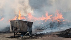 Huge fire still burning at Dallas County salvage yard; no injuries reported