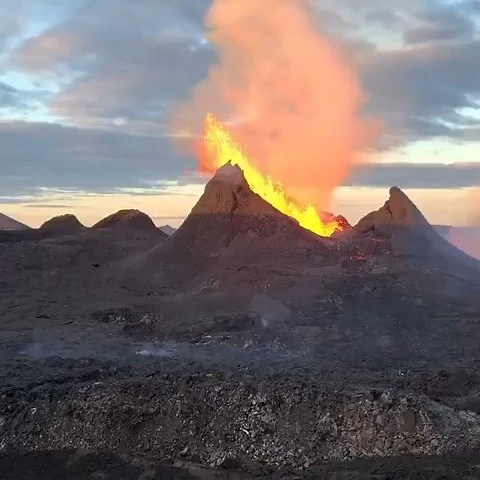A volcanic eruption ....... Causes of a Volcanic Eruption: Magma Pressure: Deep beneath the Earth, rocks melt into magma due to heat and pressure. When pressure builds up, it forces magma upward. Tectonic Activity: Most eruptions occur along tectonic plate boundaries where plates are either colliding or moving apart. Gas Expansion: Magma contains dissolved gases. As it rises, pressure decreases, causing gases to expand and erupt violently. 🔥 Types of Volcanic Eruptions: Effusive Eruption: Lava