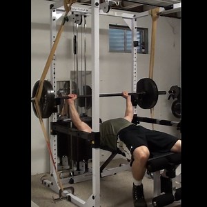 Two Band Bench Press...if you've ever wondered if you can do a reverse band bench press at the same time as a band-resisted bench press, here's your answer. Yes. Yes, you can. And they don't just cancel each other out. It actually works pretty well. It does take a bit of setup to accomplish but it really follows the strength curve of the bench press nicely while also minimizing the weaknesses of each form of band bench press training. For example, when doing a reverse band bench press, it takes 