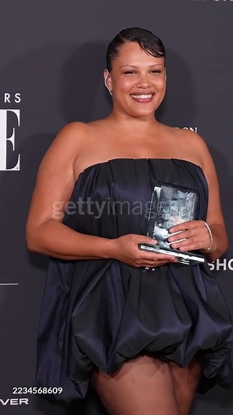 Alva Claire poses with the Model of the Year award inside the winners...