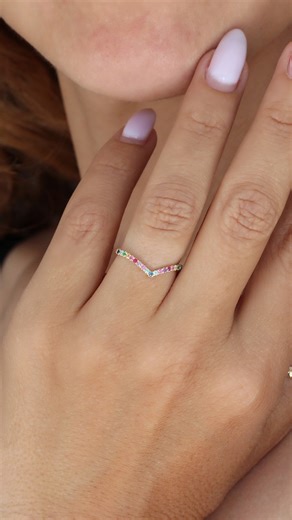A splash of fun and color!  The Rainbow Color V Ring shines bright...