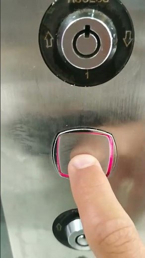 Clicking an elevator button.