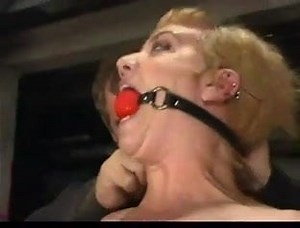 Blonde in overextended bondage