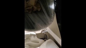 Shakily Pissing in the Garbage