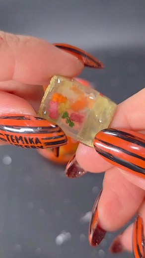 POV: Your Trick or Treat Bucket is Tiny 😭 Micro Gummy Bears I made a Carmex lip balm into a mini Trick-or-Treat bucket. The only thing it needs is to be filled with some candy. This tiny bag of Haribo gummy bear bag wasn't giving me the whimsical feeling I needed. Two versions, Liquid filled= far superior! | Temika S