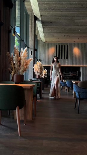 Kimberly An elegant all-beaded sheath gown with a halter neck, keyhole back, and detachable puff sleeves. A dress has an unlined skirt with a bodysuit for a sheer-leg effect but can also be styled with a long lining. The sexy skirt slit adds a peculiar zest to the whole look . . #weddingdressshopping #weddingdress #wedding #love #bridal #fashion #luxury #bridalwear #fashionstyle #bridalinspiration #bridalvogue #fashionista #bride #bridetobe #bridedress #weddinginspiration #weddingstyle #doncaste