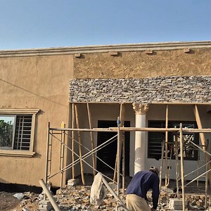 Installation of natural stone cladding. Wall design | Steven Stone Design