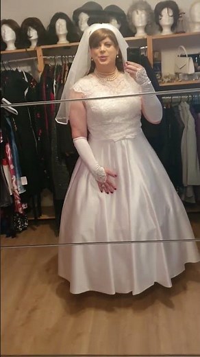 Christina d'Yvon - elegant crossdresser as brunette bride
