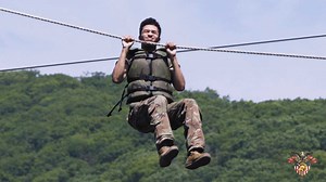 Permission to drop! USMA cadets participate in the Water Confidence Course at Camp Buckner during Cadet Field Training. The obstacle is meant to build confidence and overcome the fear of heights and water as each cadet attempts the course, comprised of two phases—the slide for life and the beam walk-rope drop. | West Point - The U.S. Military Academy