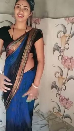 Wet Bhabhi dancing in bathroom showing backless blouse and navel in saree